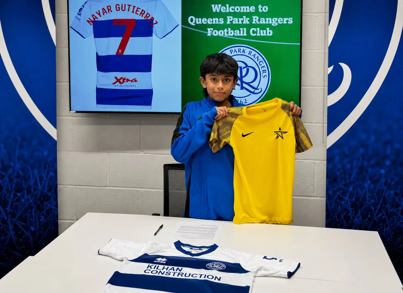 A J-Stars player at a professional club signing